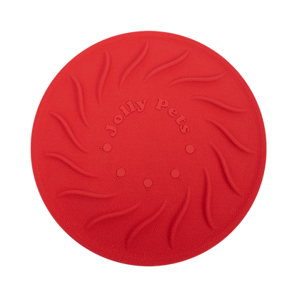 Jolly Tuff Flyer dog toy in red, designed for durable play and fetching activities