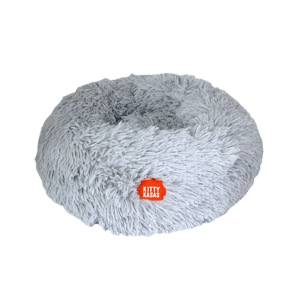 Cozy gray plush donut cat bed with soft fabric for ultimate comfort and warmth