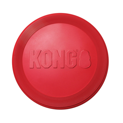 Kong red rubber flyer for dogs, durable and designed for fetch and playtime outdoors
