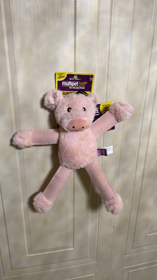 The Family Pet plush dog toy bungee shaped like a pink pig with soft body and textured limbs