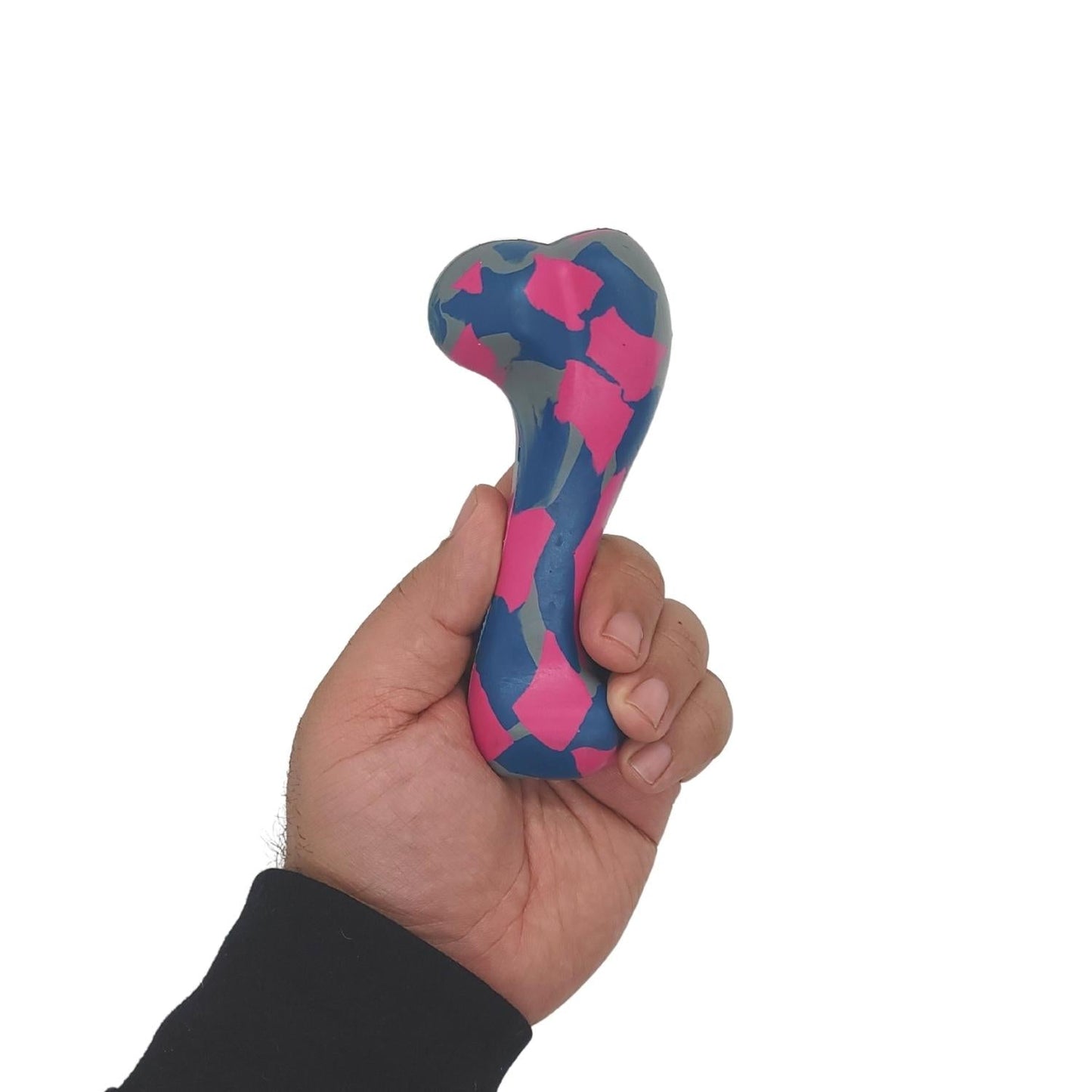 American Pet Supplies natural rubber dog chew toy in blue and pink held in hand