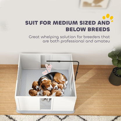 Whelping box for dogs with medium sized breed and puppies resting inside on a wooden floor