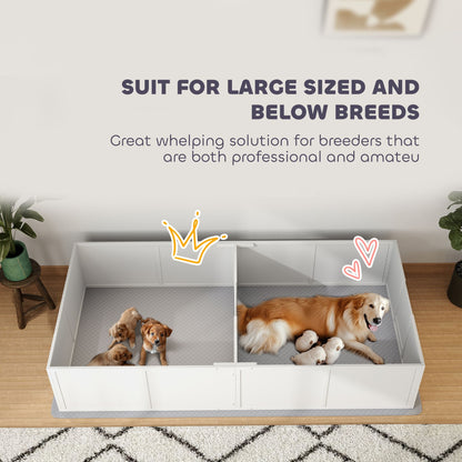 White whelping box for puppies with two sections holding a dog and puppies on a wooden floor