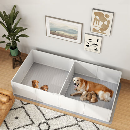 White whelping box for puppies with mother dog and puppies inside in a modern living room