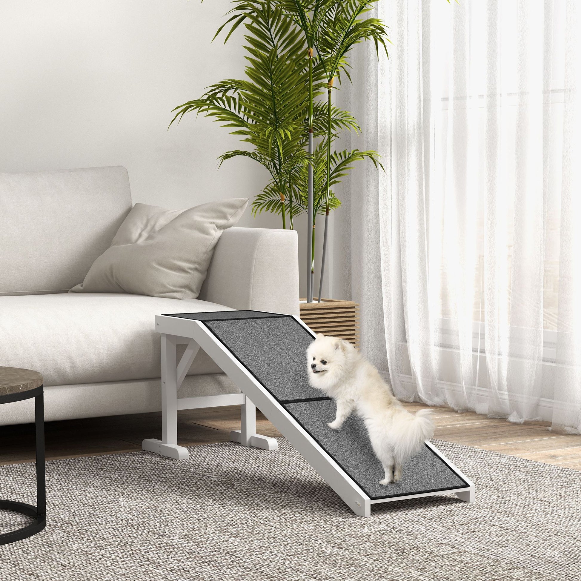 Pet ramp for dogs and cats with non-slip surface and sturdy white frame in modern living room