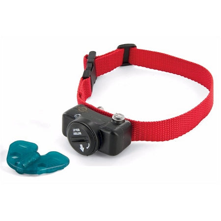 PetSafe Deluxe dog collar with red adjustable strap and black control unit for underground fences