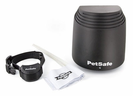 PetSafe wireless fence system with black transmitter, remote collar, and setup accessories