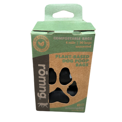 rōmng compostable dog poop bags in a cardboard packaging with 6 rolls of unscented bags