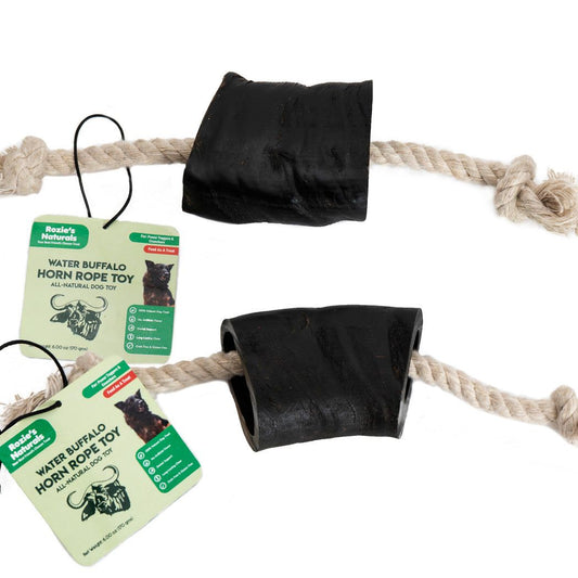 Water buffalo horn dog chew rope toy with natural black horn pieces and durable rope from PawCounter.com
