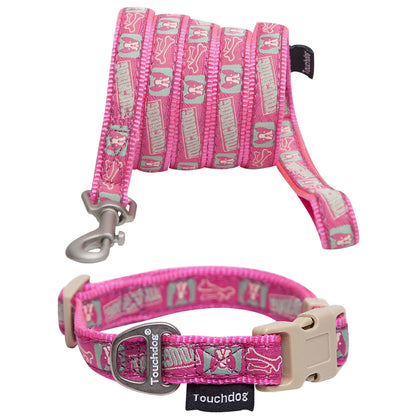 Pink designer dog leash and collar set with bone and paw print pattern from PawCounter.com