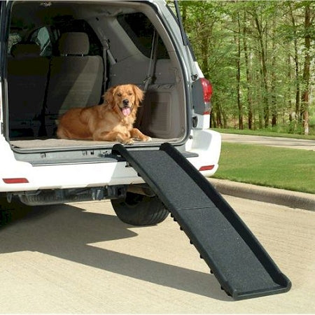 PetSafe Ultralite dog ramp attached to SUV with golden retriever resting inside vehicle