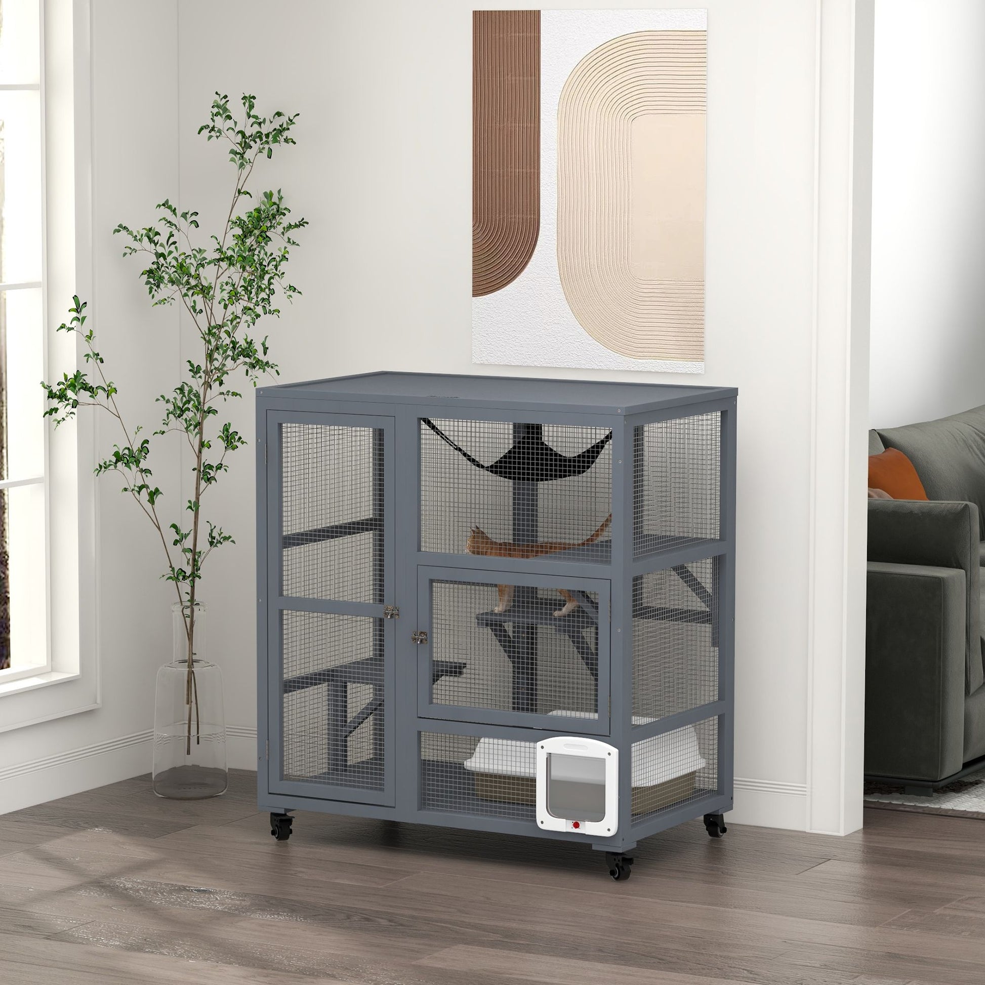 Gray indoor cat house on wheels with mesh sides and climbing platforms in modern living room