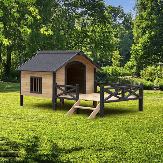 Large wooden dog kennel with black roof and fenced porch on green lawn by PawCounter.com
