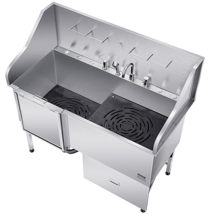 Stainless steel dog grooming tub with dual compartments and adjustable faucets for efficient grooming