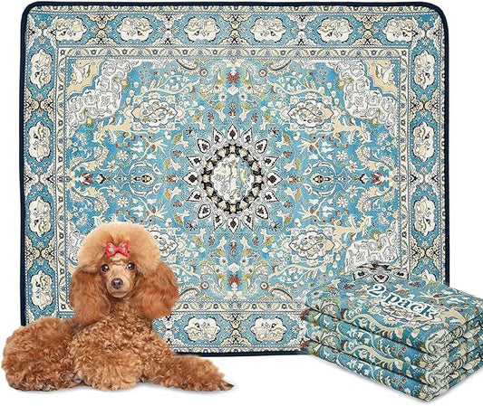Decorative blue washable pee pads for dogs with intricate pattern beside a brown poodle