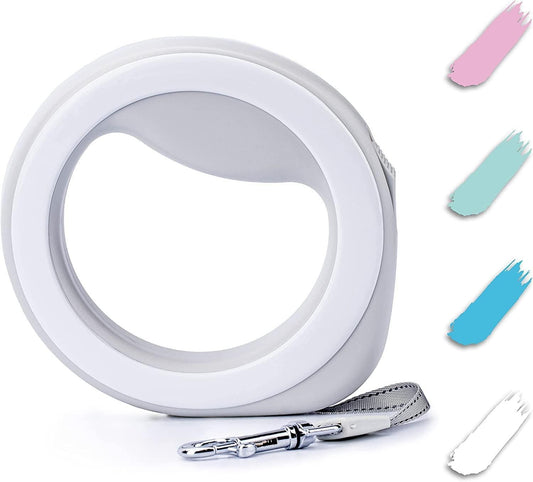 Hands free retractable dog leash in white with ergonomic circular design and sturdy clip