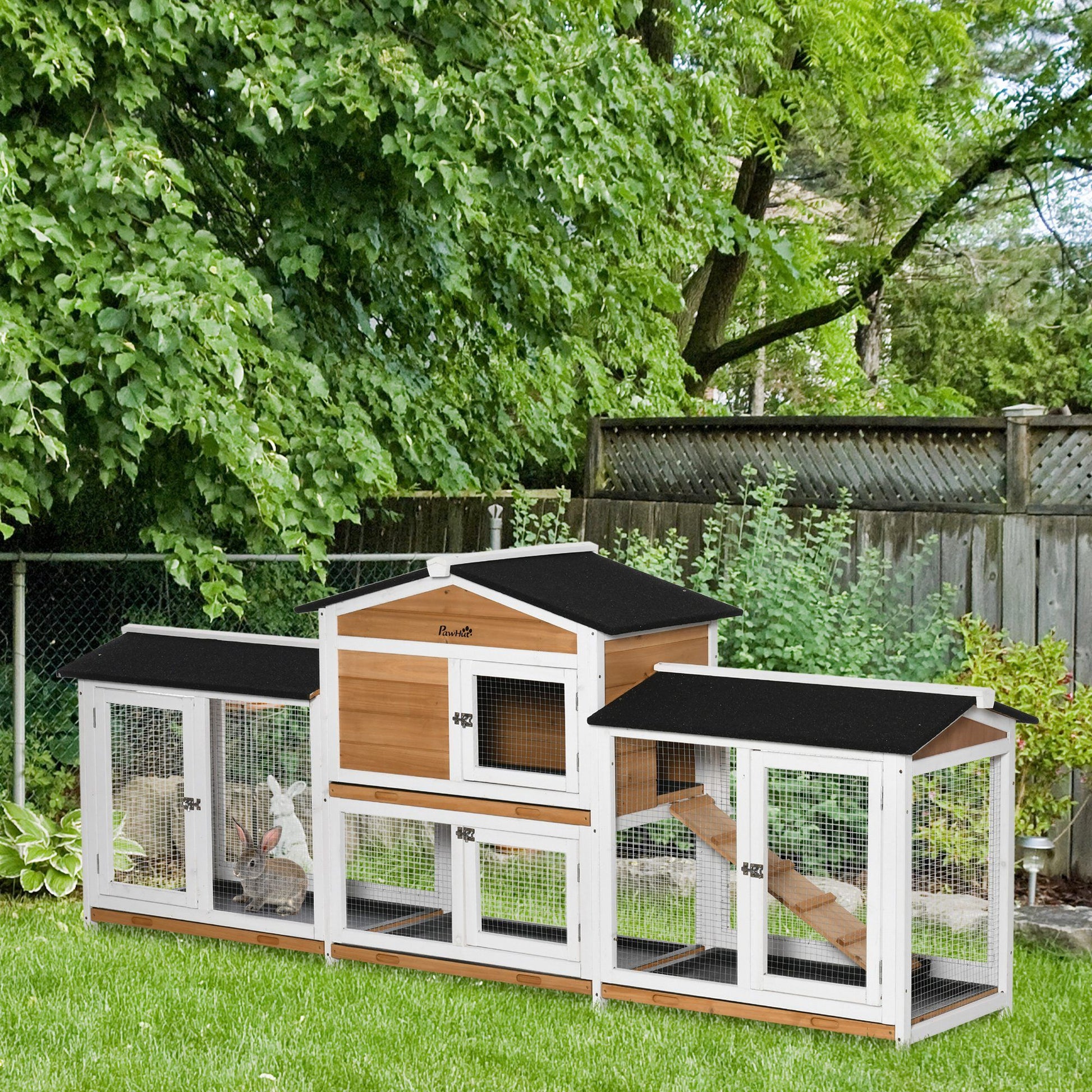 Spacious wooden rabbit hutch for small animals with multiple access points and outdoor space